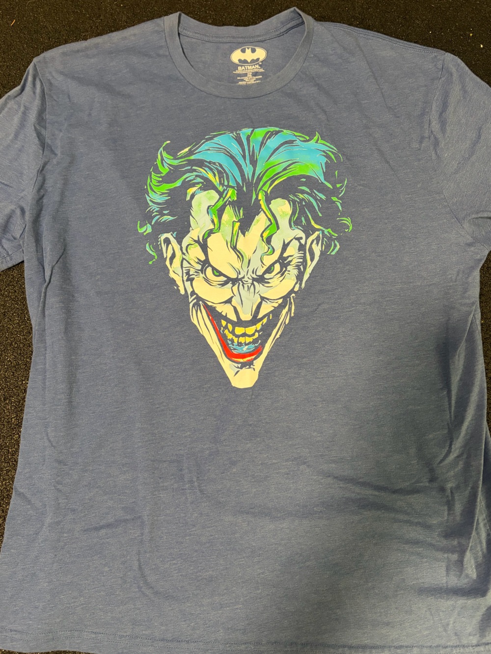 Batman Men's Short Sleeve T‑Shirt in Slate Blue with Neon Joker Graphic